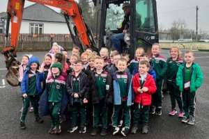 Diggers, Learning, and Big Smiles at St. John’s Primary School!