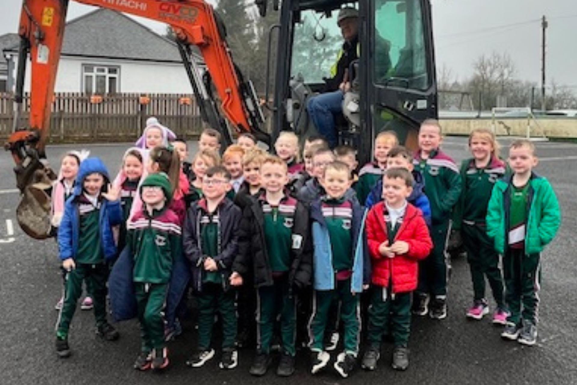 Diggers, Learning, and Big Smiles at St. John’s Primary School! Diggers, Learning, and Big Smiles at St. John’s Primary School!