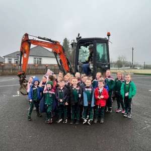 Diggers, Learning, and Big Smiles at St. John’s Primary School!