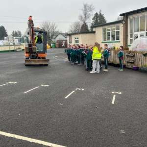 Diggers, Learning, and Big Smiles at St. John’s Primary School!