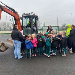 Diggers, Learning, and Big Smiles at St. John’s Primary School!
