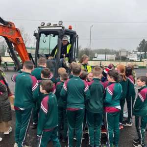 Diggers, Learning, and Big Smiles at St. John’s Primary School!